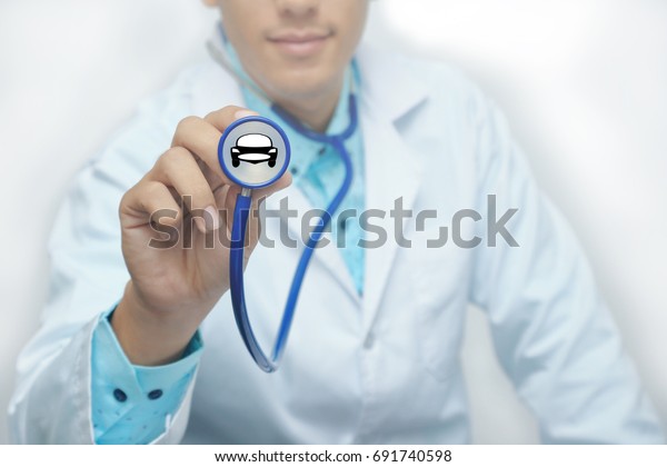 Doctor show\
car on stethoscope for car care\
concept