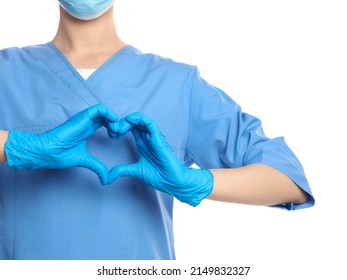Doctor showing heart on white background, closeup