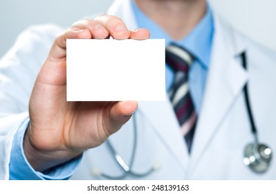 Doctor showing his business card