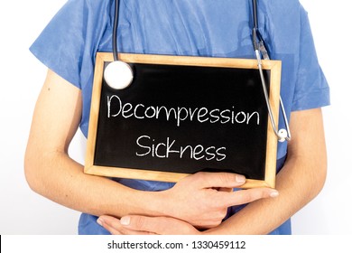 Doctor Shows Information On Blackboard: Decompression Sickness.  Medical Concept.