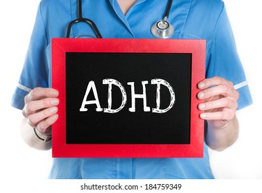 Doctor Shows Information On Blackboard: Adhd