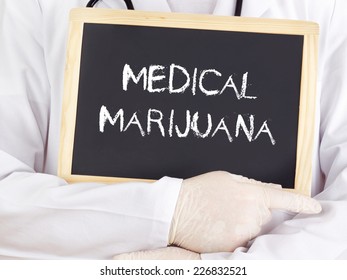 Doctor Shows Information On Blackboard: Medical Marijuana