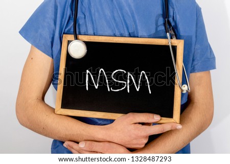 Doctor shows information on blackboard: msm.  Medical concept.