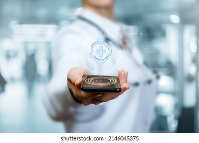 The Doctor Shows The Location Of The Medical Institution On The Phone.