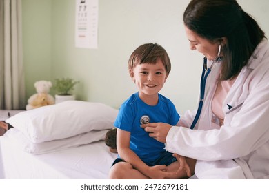 Doctor, stethoscope and child in hospital for healthcare, health and wellness with medical exam. Female pediatrician, assessment and patient in clinic for heart, lungs and cardiology with portrait - Powered by Shutterstock