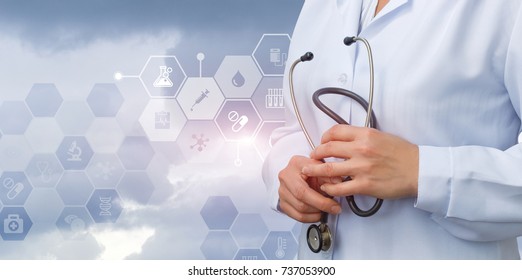 Doctor with stethoscope in hands waiting for the test results. - Shutterstock ID 737053900