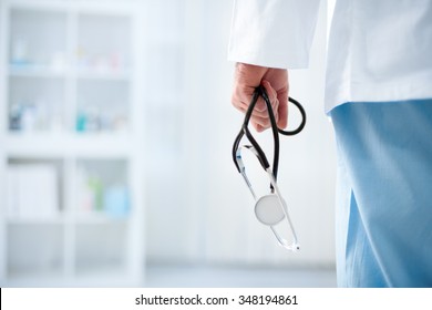 
Doctor With Stethoscope In A Hospital, Back View