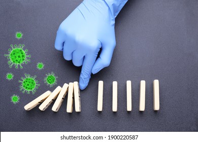 Doctor Stopping Domino Effect On Grey Background, Top View. Prevent Spreading Of Coronavirus