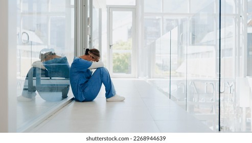 Doctor, stress and woman with depression, burnout and overworked in hospital, deadline and tired. Healthcare, medical professional and nurse crying for mistake, depressed and fatigue with anxiety - Powered by Shutterstock