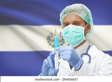 Doctor With Syringe In Hands And Flag On Background - El Salvador