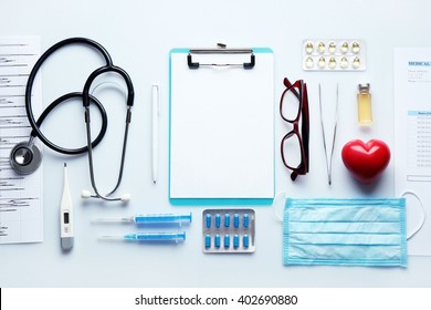 Doctor table and medicines  stethoscope   glasses  top view