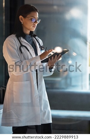 Doctor, tablet and woman planning at night in medical office, hospital and clinic for research, test results information and connection. Focus healthcare worker, telehealth and digital app technology