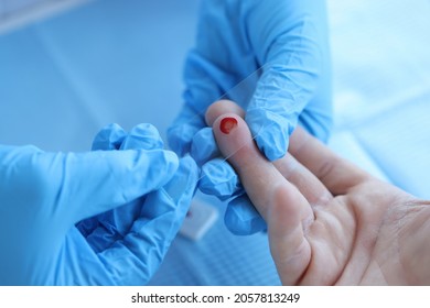 Doctor Takes Blood Sample To Check Hemoglobin Level Closeup