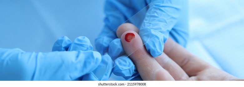 Doctor Takes Blood Sample To Check Hemoglobin Level. Blood Test For Diagnosing Diseases Concept