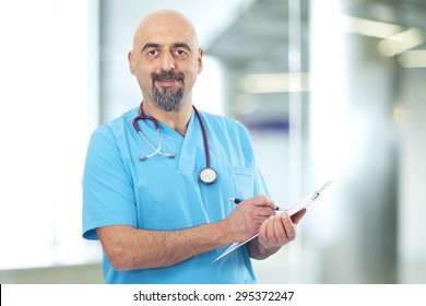 Doctor taking notes - Powered by Shutterstock