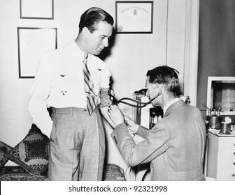 Doctor Taking A Patients Blood Pressure