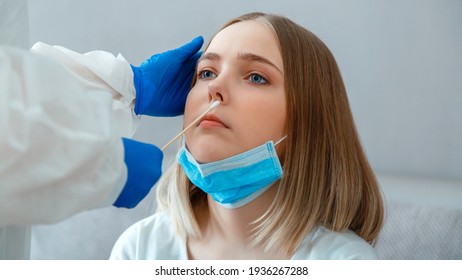 Doctor Taking PCR Test Nasopharyngeal Culture To Woman Patient. Nurse Take Saliva Sample Through Nose With Cotton Swab Check Coronavirus Covid 19 Test. Diagnostics Testing Patients. Long Web Banner.