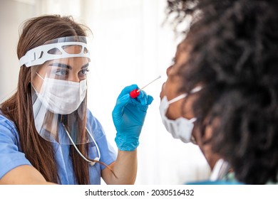 Doctor Taking PCR Test Nasopharyngeal Culture To Woman Patient. Nurse Take Saliva Sample Through Nose With Cotton Swab Check Coronavirus Covid 19 Test. Diagnostics Testing Patients. 