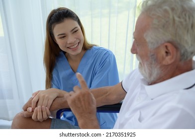 Doctor Talking To Elderly Patient With Symptoms Of Depression Look At Nature Outside The Window In A Special Patient Room.