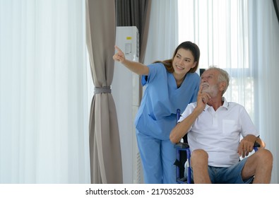 Doctor Talking To Elderly Patient With Symptoms Of Depression Look At Nature Outside The Window In A Special Patient Room.