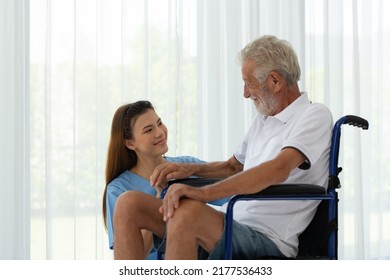 Doctor Talking To Elderly Patient With Symptoms Of Depression Look At Nature Outside The Window In A Special Patient Room.