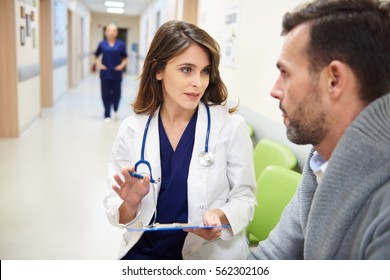 Doctor Talking To Her Patient