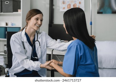 doctor talking with woman patient for monitoring and check up after surgery. doctor touching patient hand and consoling. - Powered by Shutterstock