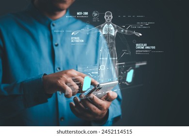 Doctor tap smartphone to display data digital x-ray of anatomy human holographic scan projection showing real-time data of people being examined, medical technology will make treatment more effective. - Powered by Shutterstock