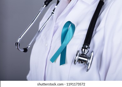 Doctor With Teal Ribbon Supporting Ovarian Cancer Awareness