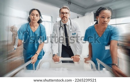 Doctor, team and rush in healthcare emergency for surgery or operation in hurry pushing hospital bed. Senior medical expert rushing patient with nursing coworkers to intensive care or theatre clinic