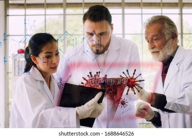 Doctor team while working analysis virus in lab with futuristic HUD screen tablet . Coronavirus disease named COVID-19. Concept for Team ,Teamwork