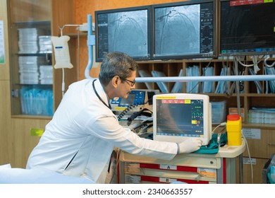 Doctor or technicians operating machine at operation theater