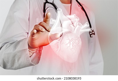 A Doctor Touches Virtual Heart In Hand. Healthcare Hospital Service Concept