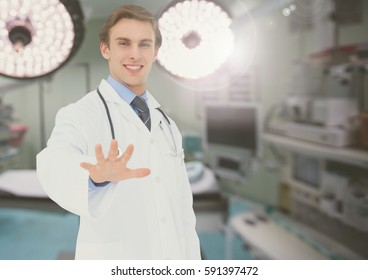 Doctor touching an invisible screen against operating room in background - Powered by Shutterstock