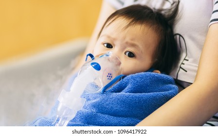 Doctor Treatment A Child Who Sick By Chest Infection After A Cold Or The Flu That Has Trouble Breathing And Prolonged Cough.A Symptom Of Asthma Or Pneumonia Cause By Respiratory Syntactical Virus.