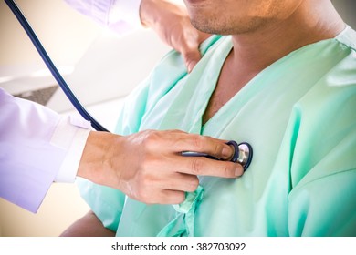 The Doctor Use Stethoscope For Checking Patient