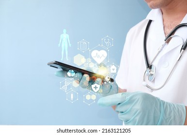 Doctor uses a smartphone to analyze human chromosome DNA genetics. Medicine. Biotechnology and medical science. In healthcare, the hospital service concept is used. - Powered by Shutterstock