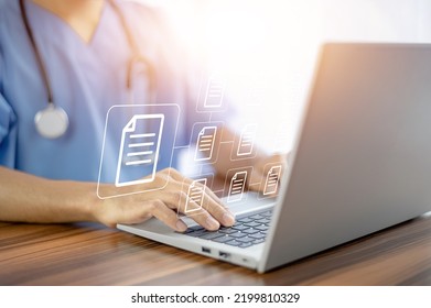 Doctor using computer Document Management System (DMS), online documentation database process automation to efficiently manage files