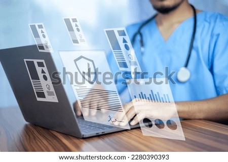 Doctor using computer Document Management System (DMS), online documentation database process automation to efficiently manage files	