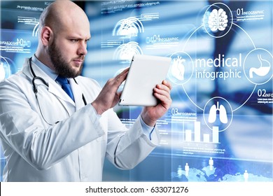 Doctor using digital tablet.