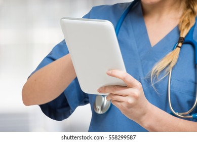 Doctor Using Her Tablet