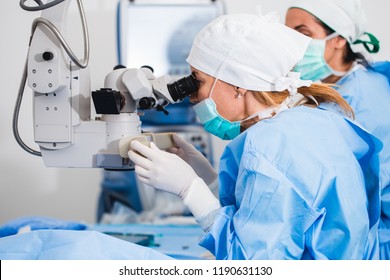 Doctor Using Microscope During Eye Surgery Process, Treatment Of Cataract And Diopter Correction. Medical Healthcare And Technology Theme.