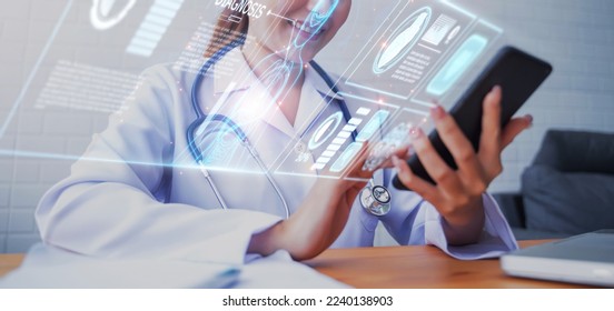 Doctor using mobile phone diagnosing patient heart for disease, technology display assistance holographic AI, healthcare medical staff in hospital treating ill people, health examine portable device - Shutterstock ID 2240138903