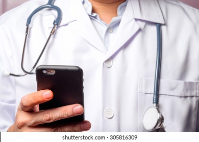 Doctor Using Mobile Smart Phone.