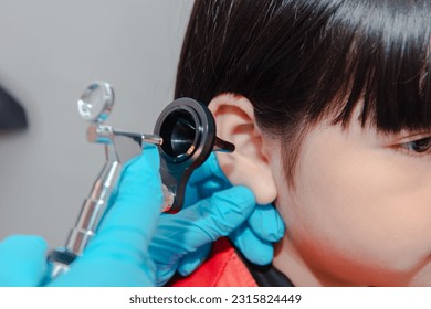 doctor using ostomoscope
ear examination for children - Powered by Shutterstock