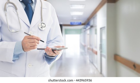 Doctor Using A Smart Phone In Hospital. Concept Of Healthcare And Medical, Communication.