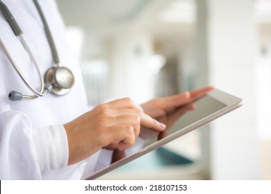 Doctor Using Tablet Computer