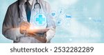 Doctor using tablet surrounded by futuristic medical icons, symbolizing digital healthcare innovation. Great for medical tech, telemedicine, and healthcare analytics.