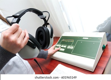 Doctor Using Test Hearing Equipment. Close-up View Of A Test Hearing Machine In A Clinic.