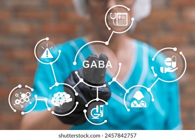 Doctor using virtual touch screen presses abbreviation: GABA. Gamma-Aminobutyric Acid ( GABA ) Medical Psychological Concept.